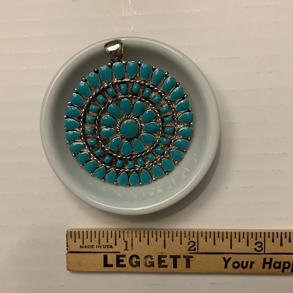 Silver toned and turquoise colored medallion for chains or chokers